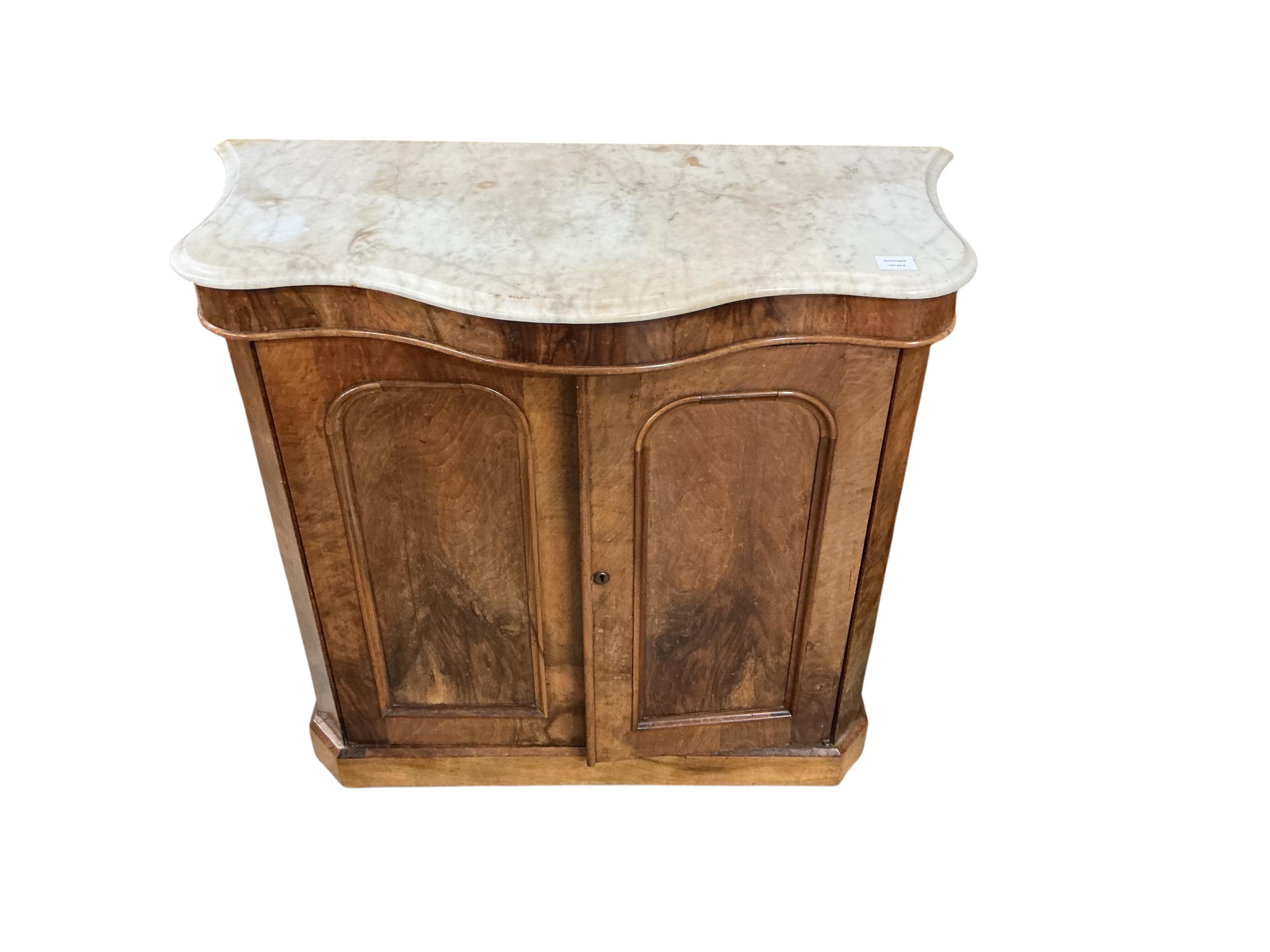 A Victorian walnut serpentine front marble top side cabinet, width 99cm, depth 46cm, height 87cm